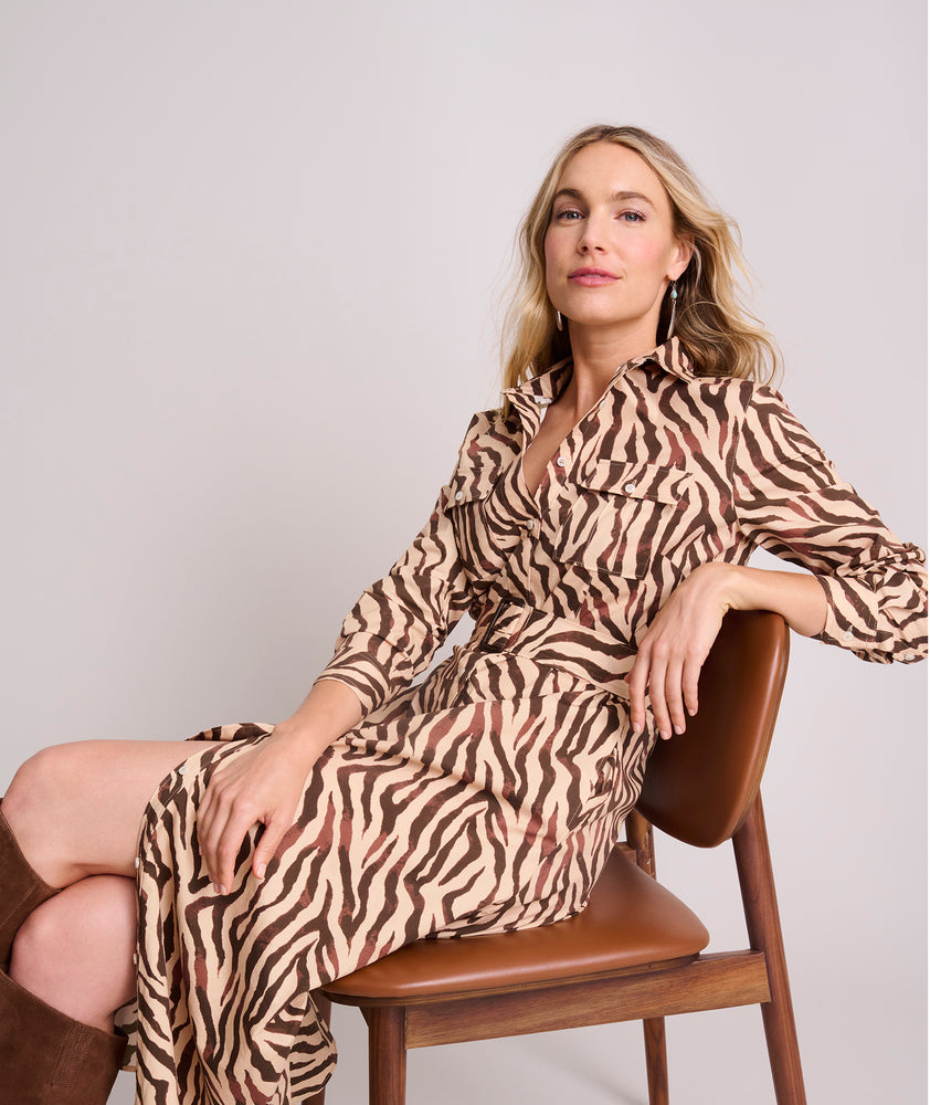 Model is wearing UNTUCKIt Cotton Stretch Safari Print Elise Shirtdress.