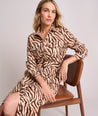 Model is wearing UNTUCKIt Cotton Stretch Safari Print Elise Shirtdress.