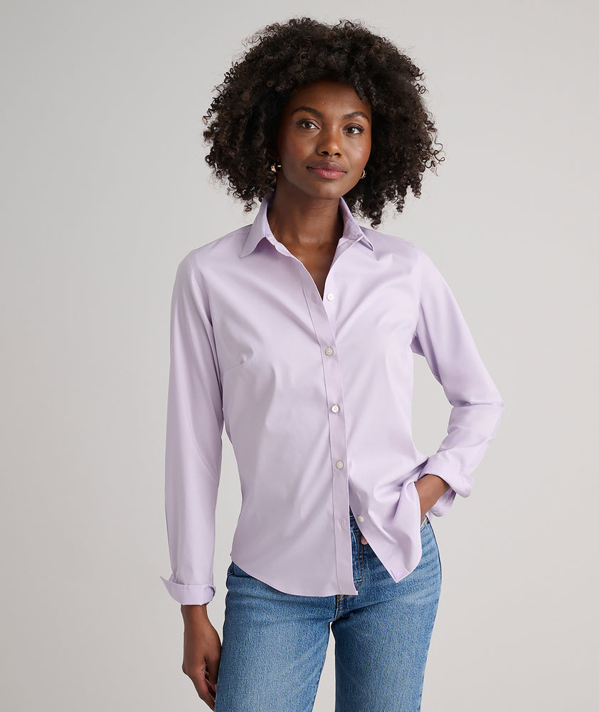 Model is wearing UNTUCKit Bella button-down in lilac.