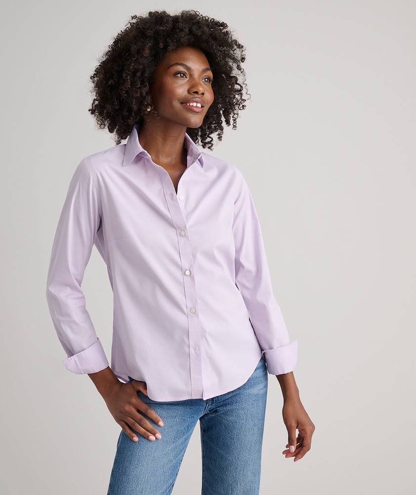 Model is wearing UNTUCKit Bella button-down in lilac.