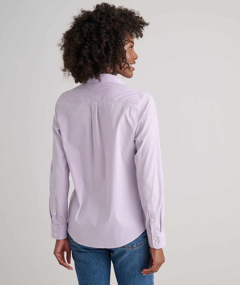 Model is wearing UNTUCKit Bella button-down in lilac.