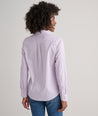 Model is wearing UNTUCKit Bella button-down in lilac.
