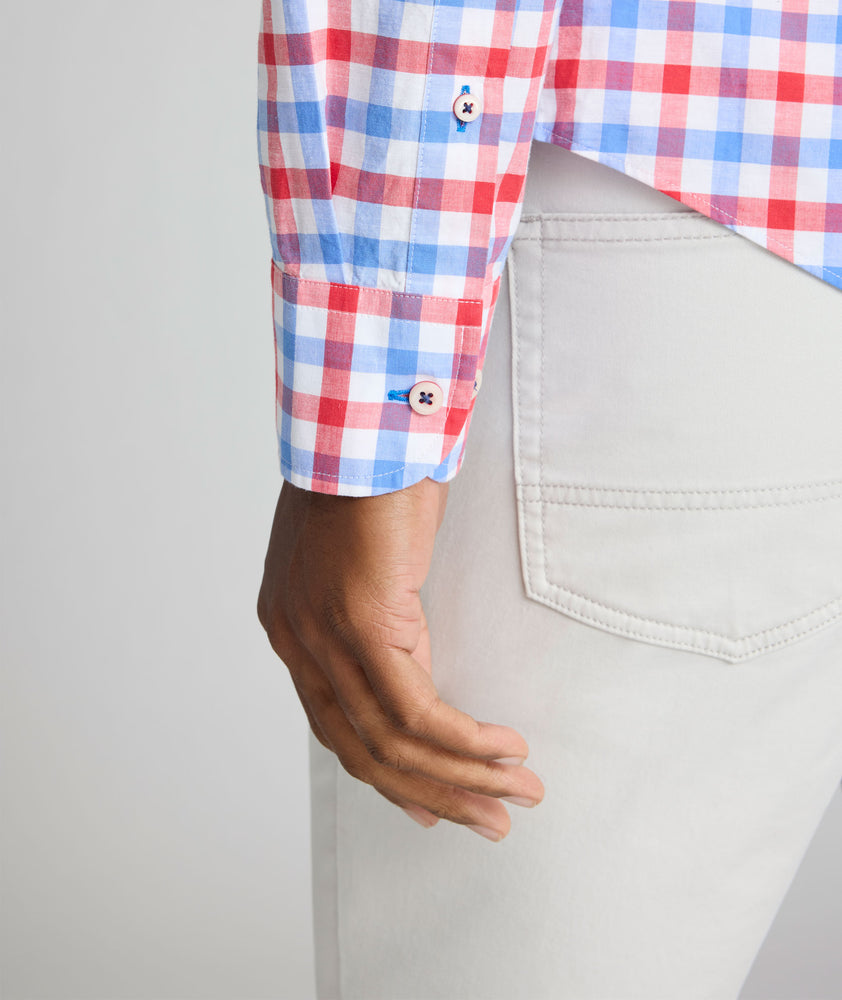 Model is wearing UNTUCKit Clarkson cotton linen shirt in red.