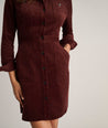 Model is wearing UNTUCKit Corduroy Cora Shirt Dress.