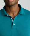 Model is wearing UNTUCKit Long Sleeve Damaschino in Dragonfly Teal.
