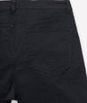 Model is wearing 5-Pocket Chino Pants in black.