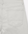 Model is wearing UNTUCKit 5-Pocket Chino Pants in light gray.