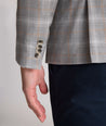 Model is wearing UNTUCKit France sport coat in gray.