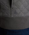 Model is wearing UNTUCKit Garrison pullover in forged iron.