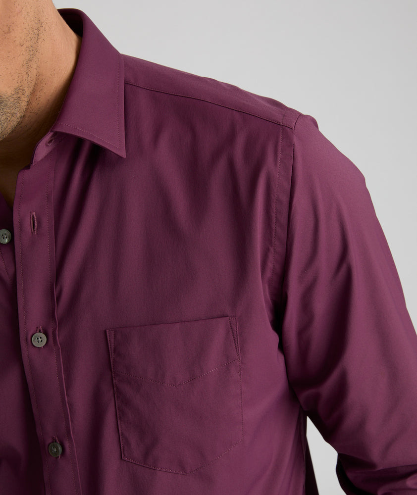 Model is wearing UNTUCKit gironde performance shirt in wine tasting.