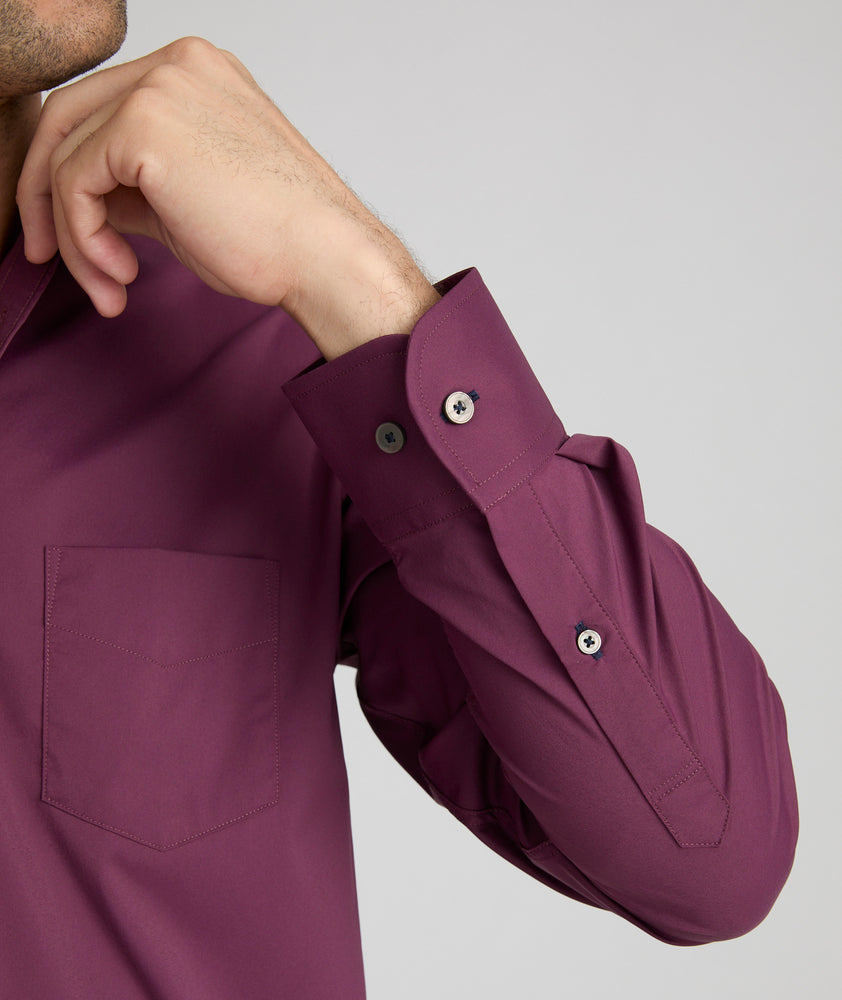 Model is wearing UNTUCKit gironde performance shirt in wine tasting.