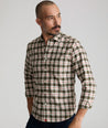 Model is wearing UNTUCKit Harwin wrinkle-free shirt.