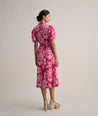 Model is wearing UNTUCKit Cotton Stretch Pink Jackie Midi Shirtdress with Belt.