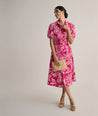 Model is wearing UNTUCKit Cotton Stretch Pink Jackie Midi Shirtdress with Belt.