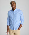 Model is wearing UNTUCKit Jamison wrinkle-free blue print long sleeve.
