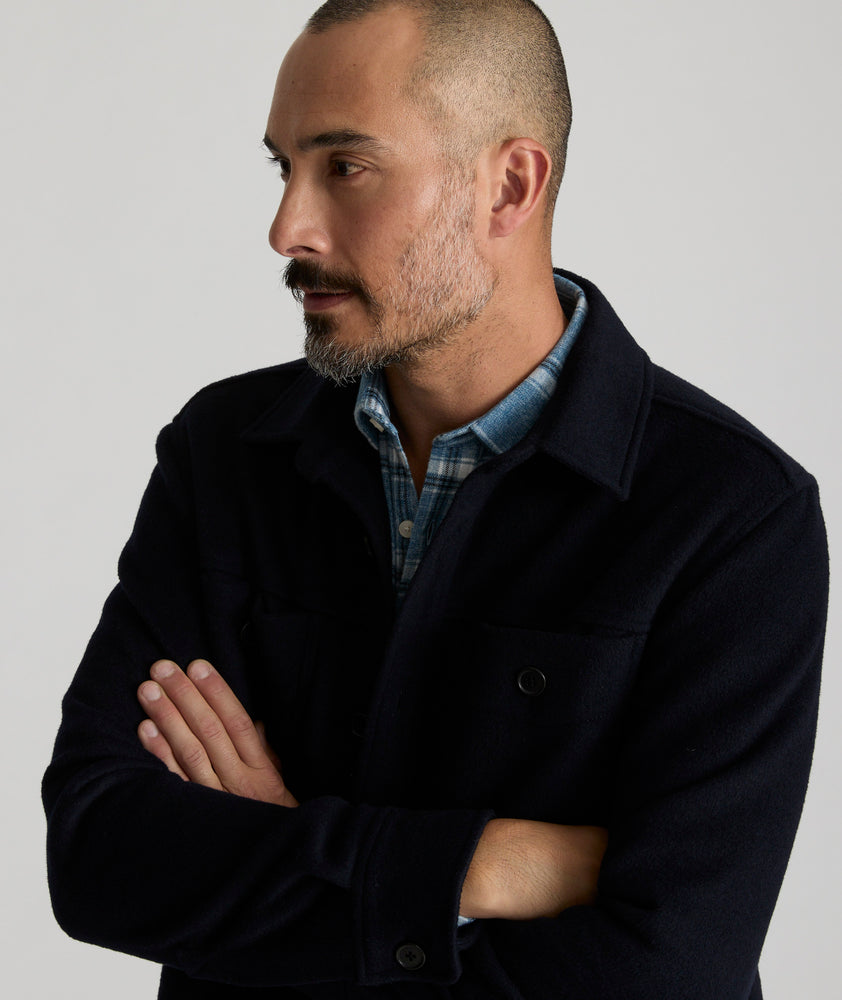 Model is wearing UNTUCKit Lagrein in blue.