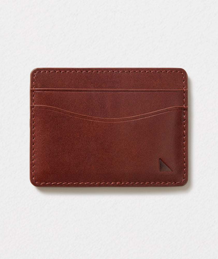 UNTUCKit leather card case in brown.