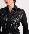 Model is wearing UNTUCKit Lexie sequin dress in black.