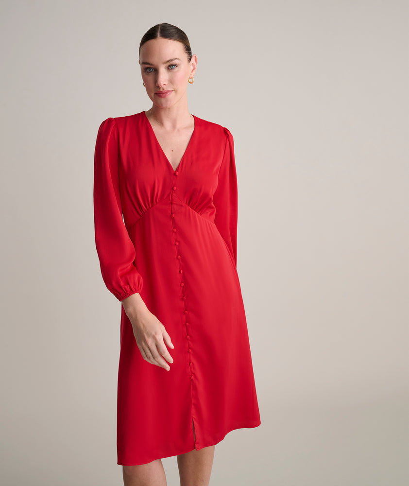 Model is wearing UNTUCKit Malorie dress in red.