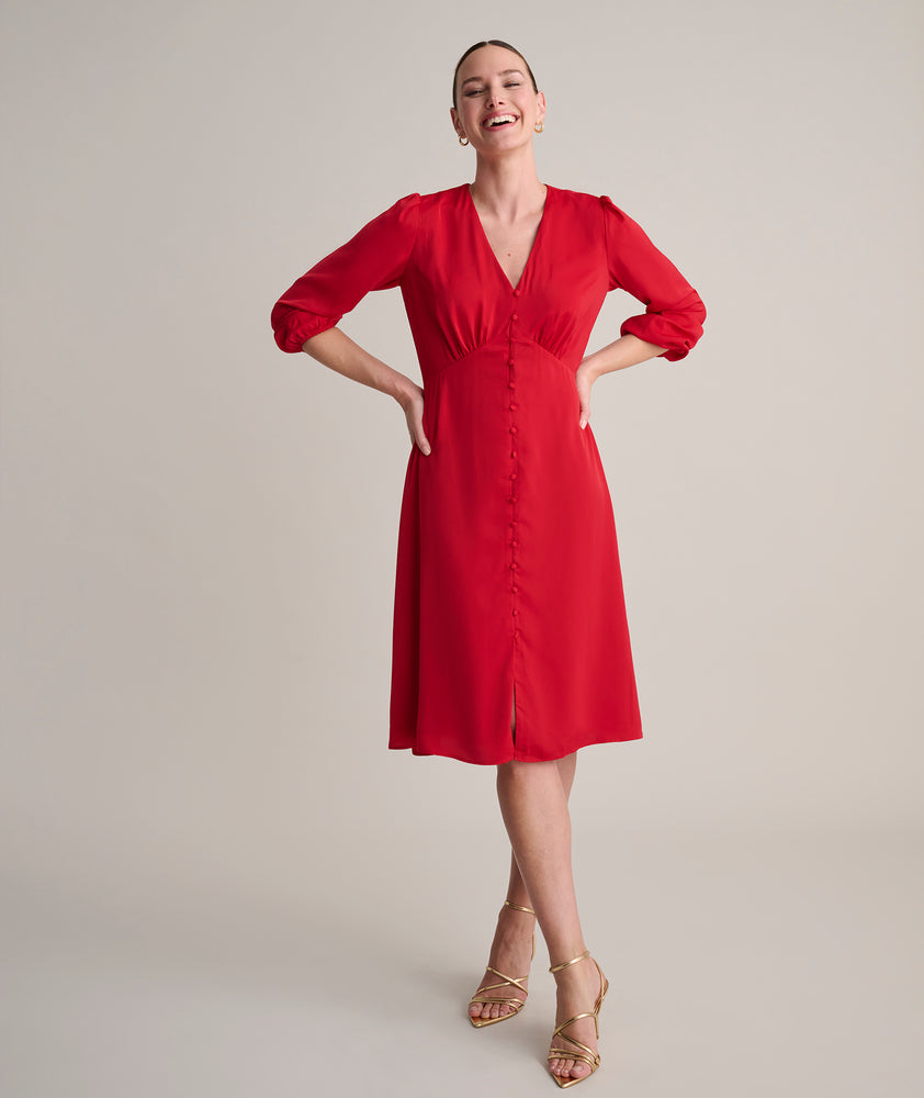 Model is wearing UNTUCKit Malorie dress in red.