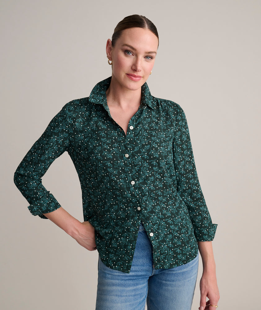 Model is wearing UNTUCKit Natalie top in green.