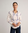 Model is wearing UNTUCKit Bandana Print Odette Shirt.