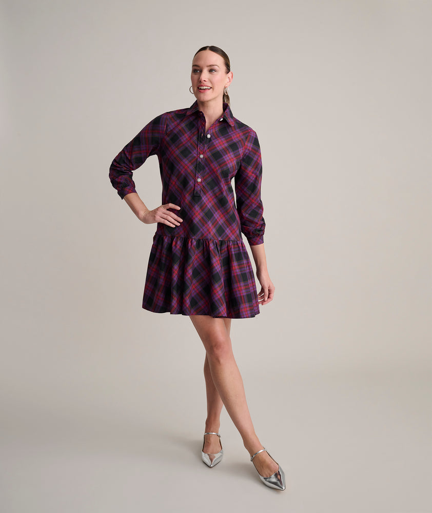 Model is wearing UNTUCKit Reese Dress in plaid.