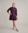 Model is wearing UNTUCKit Reese Dress in plaid.