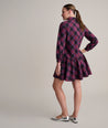Model is wearing UNTUCKit Reese Dress in plaid.