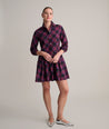 Model is wearing UNTUCKit Reese Dress in plaid.