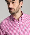 Model is wearing UNTUCKit Thorton wrinkle-free shirt in red.