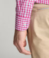 Model is wearing UNTUCKit Thorton wrinkle-free shirt in red.