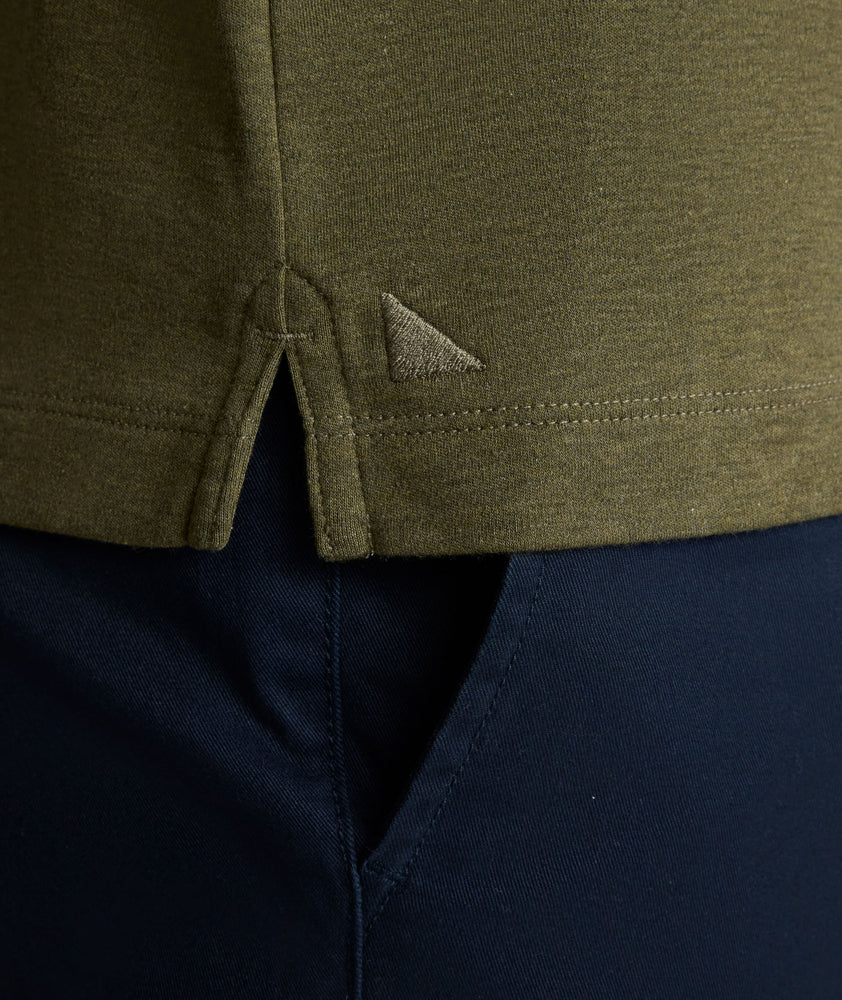 Model is wearing UNTUCKit Vargas WF Polo in Heather Olive.