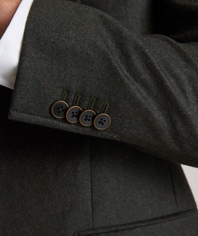 Model is wearing UNTUCKit Italian Wool Westerling Sport Coat in Olive.