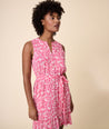 Model is wearing UNTUCKit Pink Floral Lucy Dress. 
