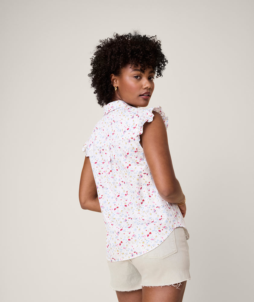 Model is wearing UNTUCKit White with Floral Print Anne Shirt.