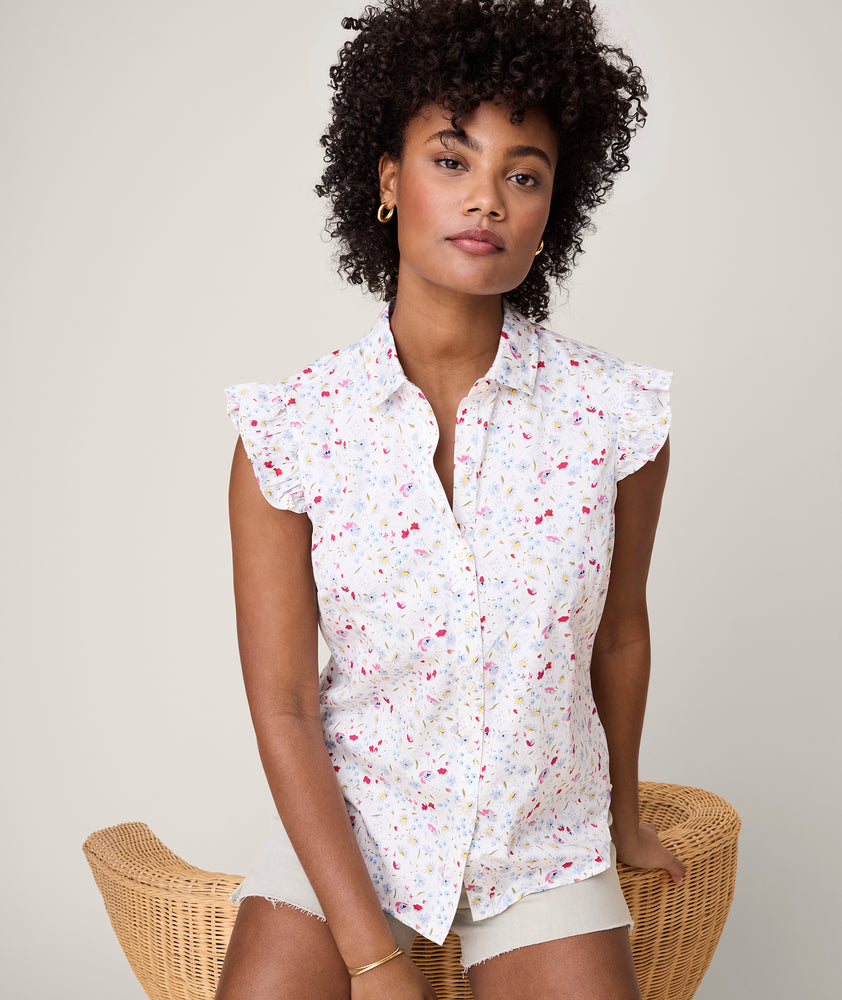 Model is wearing UNTUCKit White with Floral Print Anne Shirt.
