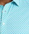 Model is wearing UNTUCKit Abbott performance print short sleeve shirt in teal.