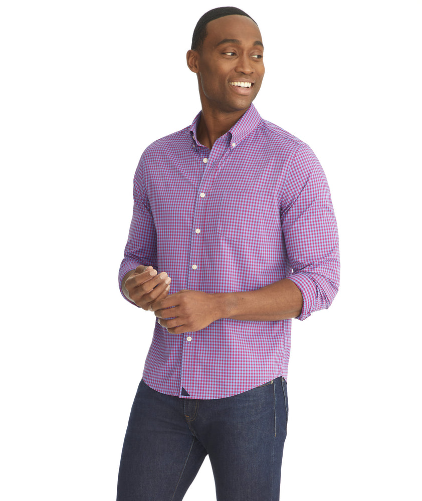 Model is wearing UNTUCKit Albarei gingham shirt.