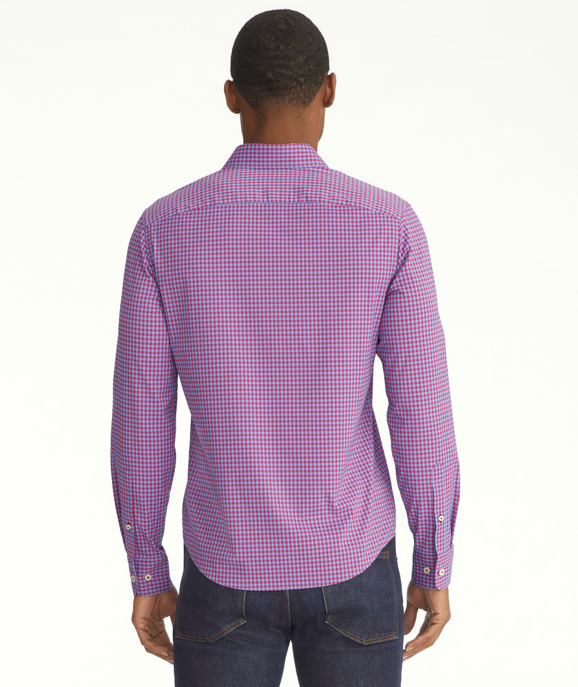 Model is wearing UNTUCKit Albarei gingham shirt.