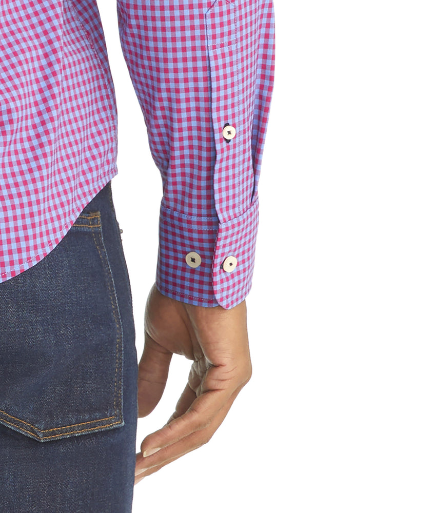 Model is wearing UNTUCKit Albarei gingham shirt.