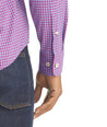 Model is wearing UNTUCKit Albarei gingham shirt.