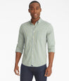 Model is wearing UNTUCKit albarei gingham shirt.