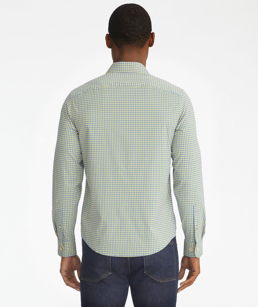 Model is wearing UNTUCKit albarei gingham shirt.