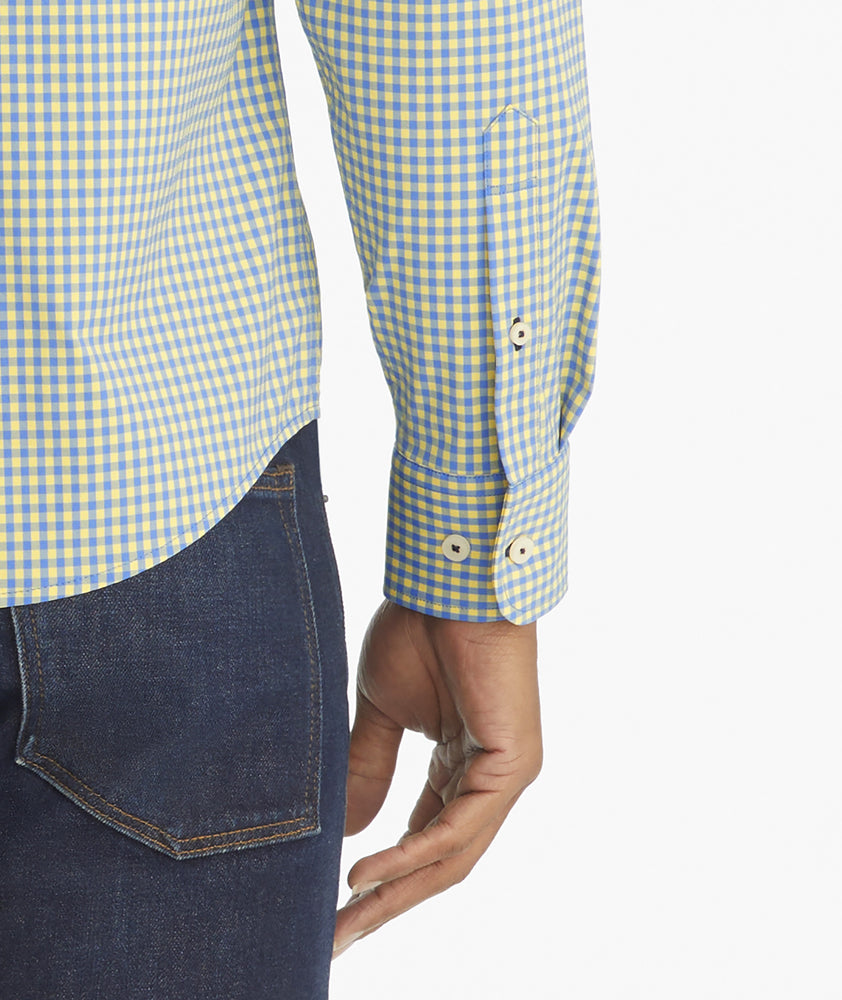 Model is wearing UNTUCKit albarei gingham shirt.