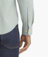 Model is wearing UNTUCKit albarei gingham shirt.
