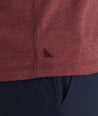 Model is wearing UNTUCKit Ultrasoft Long-Sleeve Henley in deep red.