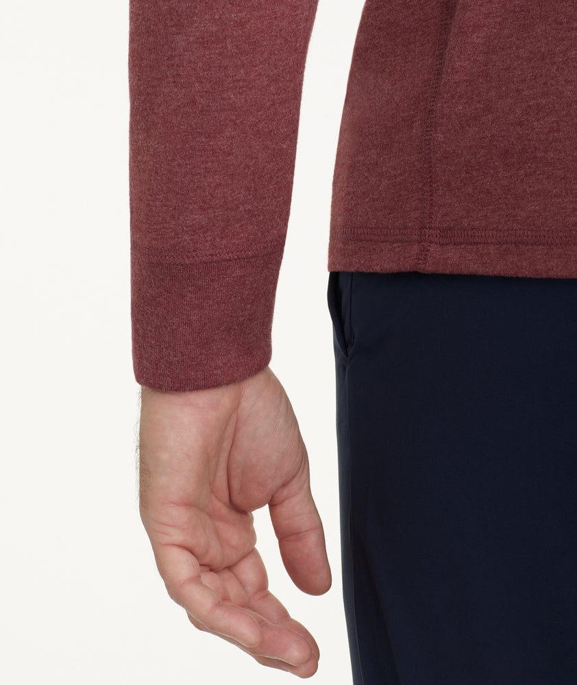 Model is wearing UNTUCKit Ultrasoft Long-Sleeve Henley in deep red.