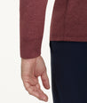 Model is wearing UNTUCKit Ultrasoft Long-Sleeve Henley in deep red.