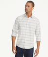 Model is wearing UNTUCKit Wrinkle-Free Performance Aleante Shirt.